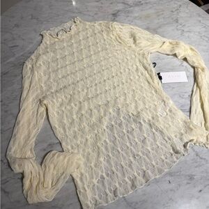 ASTR The Label turtleneck, cream lace top.